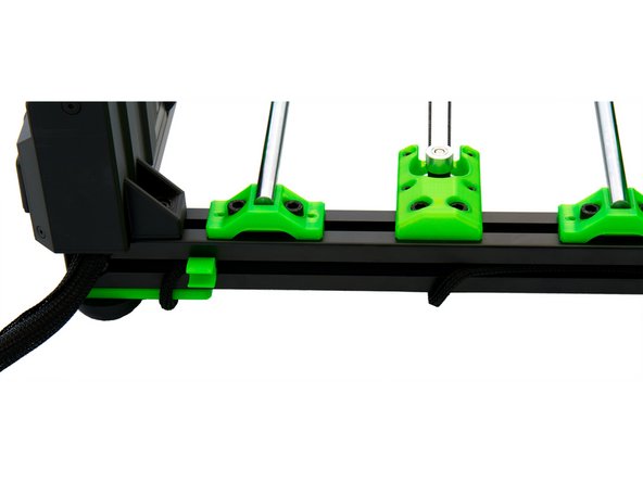 Also push the cable of the y-motor into the rear slot and route the cable until it reaches the Einsy Box.