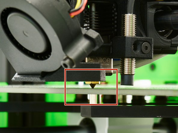 Move the x-axis all the way down and turn off the printer.
