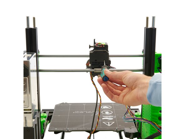 Check whether the two square nuts are located in the lower part (insertion for the lower bushing) of the x-carriage.