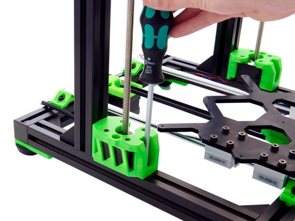 Now, push the Techflex tube surrounding the cables attached to the z-stepper motor as far into the z-motorholder  as possible.