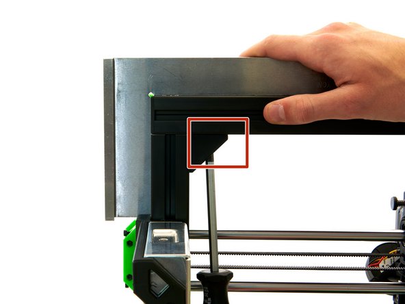 Tighten the M6x12mm Hexagon Socket Head Cap Screw in the corner bracket on the x-axis.