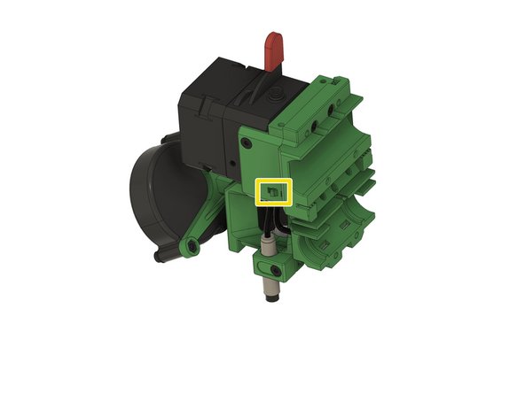 Führen Sie zunächst das Kabel des Radiallüfters durch den Kabelkanal.