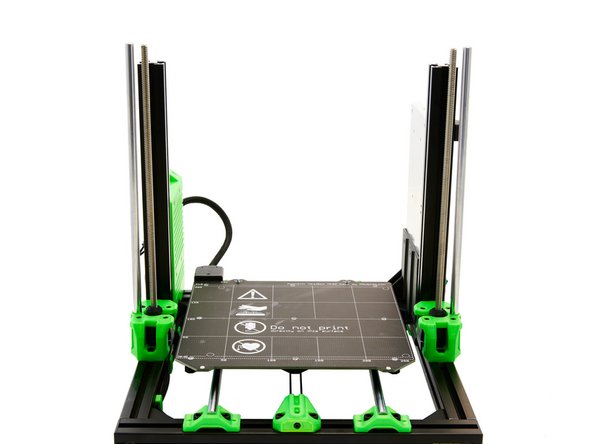 Carefully place the assembled x-axis on the z-stepper motors and z-rods.