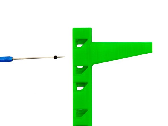 Stecken Sie die M3 Sicherungsmutter auf die Reißnadel.