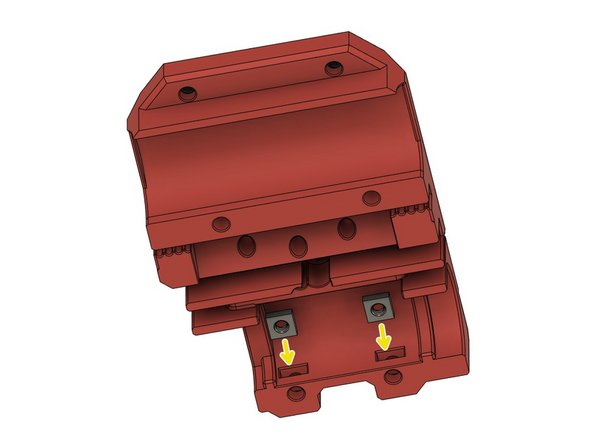 Insert 2x M3 square nut.