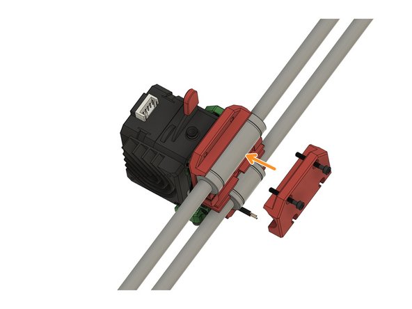 Bring the top holder back in position.