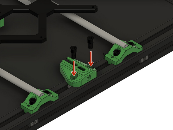 Setzen Sie den y-Riemenspanner auf 2x Nutensteine in der vorderen x-Achse und befestigen Sie diesen lose  mit 2x M6x12mm Zylinderkopfschrauben.