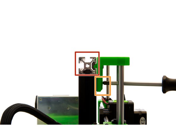Slide the x-axis over the T-Nut and make sure that the Nut and the T-Nut are at the same level.