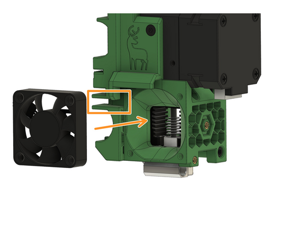 Place the extruder on the LGX holder in such a way that (1) the cables are pointing towards the channel and (2)  the sticker on the fan is pointing towards the inside of the extruder.