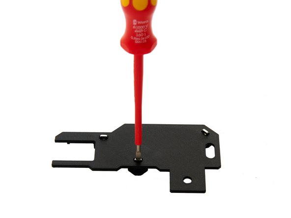 Push the square nuts (e.g. with a flathead screwdriver), to the bottom of the slots.