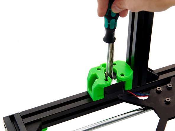 Screw the z-stepper motor to the z-motorholder using 4x M3x10mm Hexagon Socket Head Cap Screws.