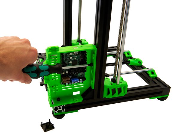 To do this, it may be helpful to remove the end cap. Remember to put the end cap back into place after tightening the screws.