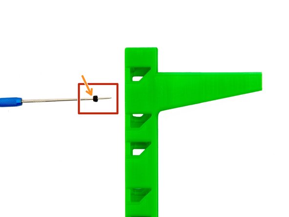 Put the M3 Self-Securing Nut onto the engineer scriber.