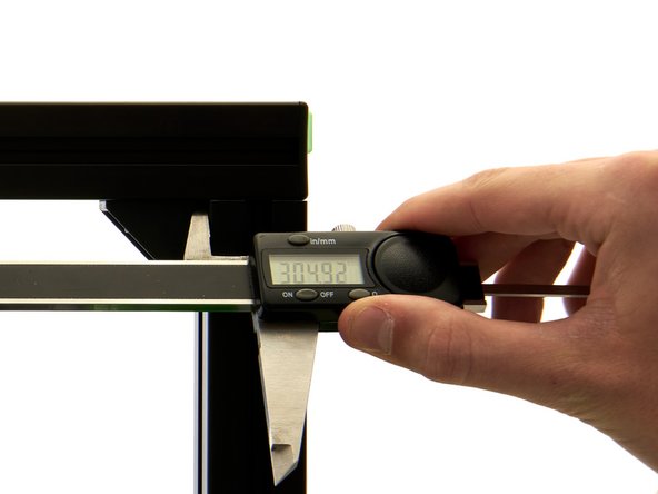 To do this, place the caliper at the corner brackets.