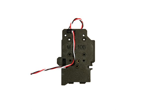 Now, feed the filament sensor cable through the cable guide in the back of the x-carriage.