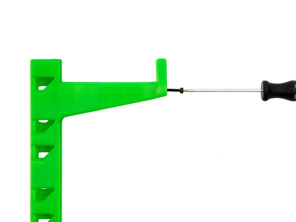Stecken Sie die Kappe auf die Spulenhalterung.