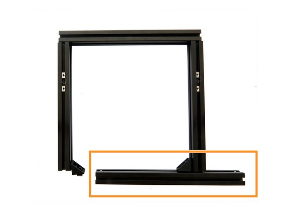 Now, insert the front x-extrusions into the corner brackets.