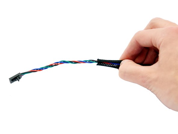 The two ends of the Techflex tube are briefly heated with a lighter.