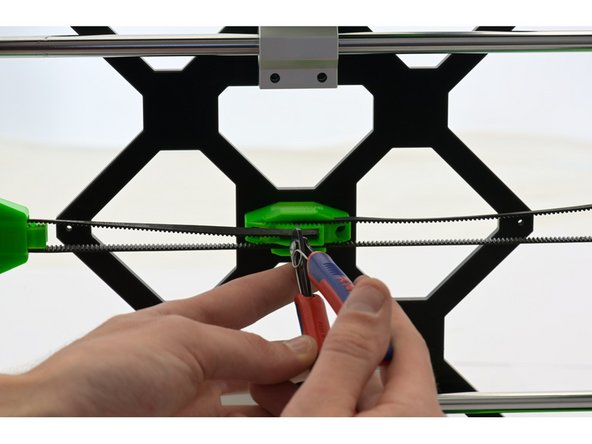 Now hold the belt against the belt holder to see how much of the belt you need to cut off.