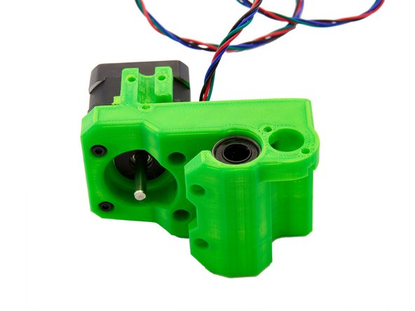 One of the greased LMUW10 bushings is pushed into the x-motor holder so that it is centered. Then the bushing is fixed with 2x M3x30mm Hexagon Socket Head Cap Screws.