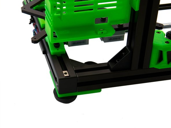 Attach the Einsy Box to the left side of the printer, using the T-Nut that was just attached. The T-Nut is pushed into the rear slot of the left z-extrusion.