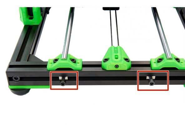 Screw 2x M6x12mm cylinder head screws  loosely  into the 2x T-nuts , which are located in the front slot of the front x-profile.