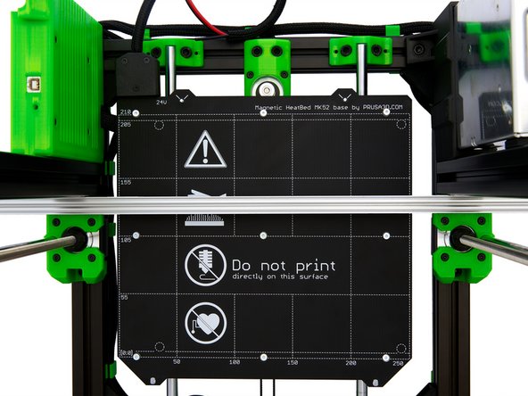 Now, place a long straight object, (e.g. a ruler or an aluminum extrusion) between the z-stepper motor and the z-profile on the heatbed (see Fig. 1).