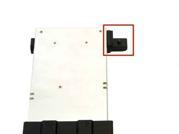 From the outside, a T-nut is loosely attached.