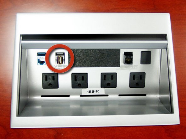 OPTIONAL: You can mount a thumb drive (or other USB device) by plugging it into any of the white USB jacks on the conference table.