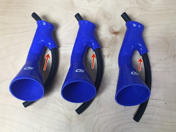 Leave approximately 1" of hose sticking out of the attachment top as shown