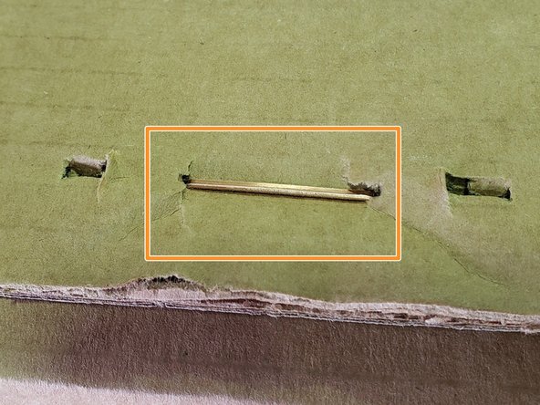 Boxes should be stapled within the range of the leading edge of the stapler, as shown