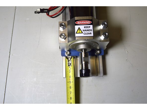 Place the Spindle Assembly on the V-Slot profile so that the Spindle Plate is 40mm from the bottom of the profile