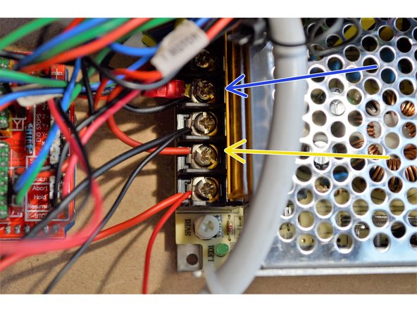 Connect the other end of the cable to one of the V+ ports on the 12V power supply as shown