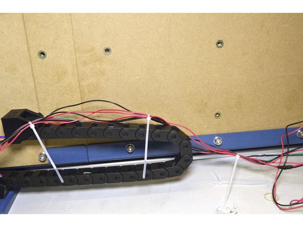 Tie cables down as shown in the pictures