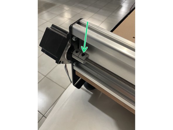 Tighten the two Y lead screws by tightening the two grub screws in each of the pillow block bearings mounted to the front plate as well as the allen key cap screw in the rigid couplings holding the Y lead screw.