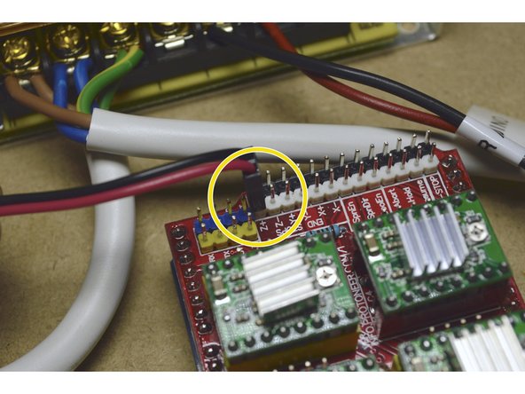 Plug the 2 pin connector to the Z+ pins on the CNC shield with the red cable closest to the stepper drivers as shown