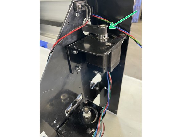 Hook the GT2 Timing belt over the pulley before you fully tighten the screws holding the motor.