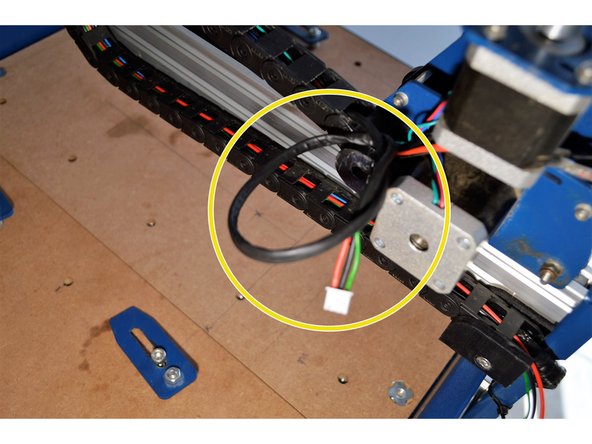 Adjust the length of the cable on the spindle/laser side that only the heat shrink is sticking out of the X-drag chain