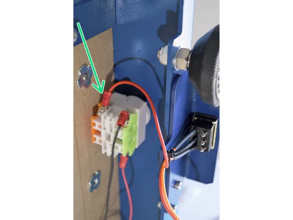 Connect the short red cable (centre pin on toggle switch) to the orange side (normally closed) on the E-Stop