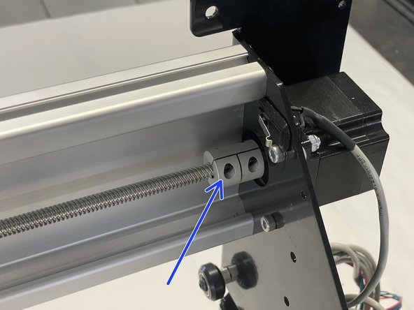 Slide the lead screw back into the rigid coupling mounted to the X-Motor and tighten the rigid coupling onto the lead screw with a 2.5mm Allen Key.