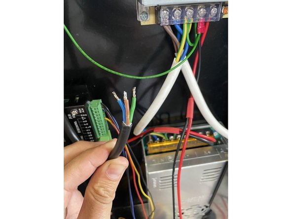 Connect the spindle cable (black cable with blue, brown and green wires) to the brushless speed controller as shown in the picture.