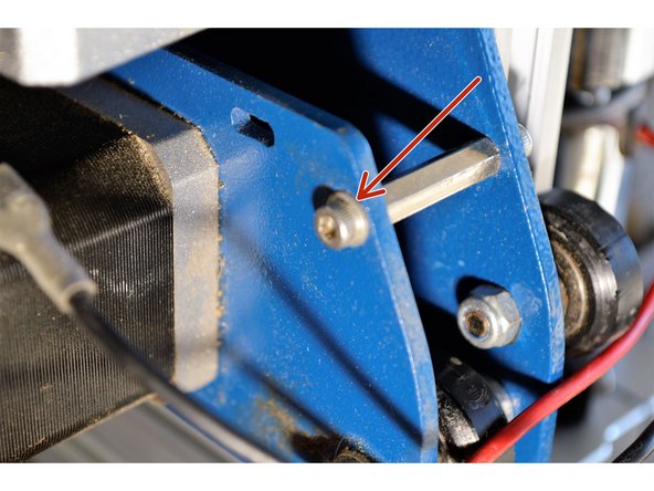 Remove the M3 screw and washer from the stand-off next to the X-motor