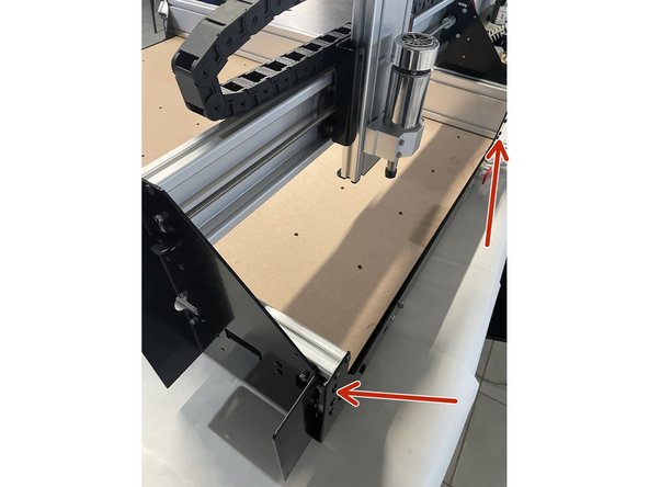 Slide the X-Gantry to the front by turning the Y lead screw simputaniously by hand until the X-Gantry is against the front plate.