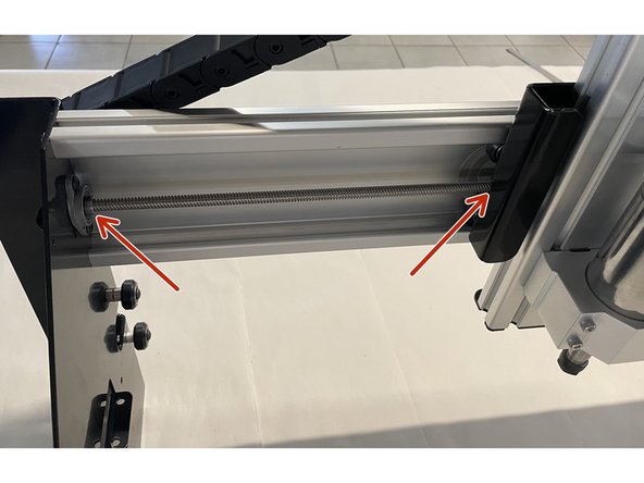 Turn the X-Axis Lead Screw into the Delrin Block on the back of the Spindle Assembly till you can push the lead screw through the pillow block bearing on the Left Gantry.