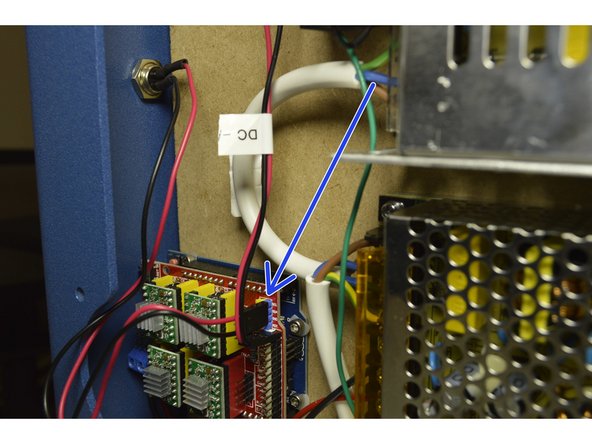 Connect the cable from the GX12 connector on the back panel to the Electronics module