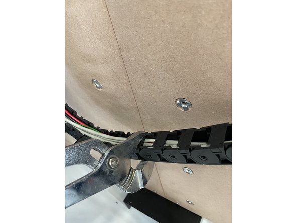 Groove Joint Pliers works well to close the drag chain.