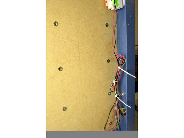 Tie cables down as shown in the pictures