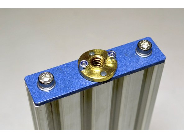 Use the M5x16 cap screws (2 Pcs) and M5 Washers (2 Pcs) to mount the plate to the V-Slot profile