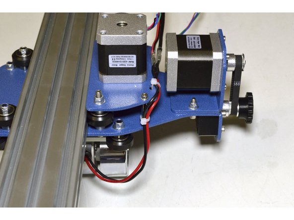 Tie the cable down with cable ties (2 Pcs) so that the connectors are positioned between the X and Z-Motor (This will ensure the spindle cable has enough slack for the spindle to move up and down)