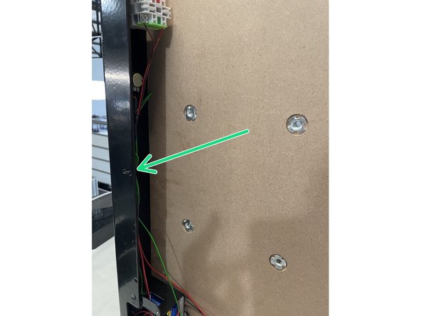 Tie the cables going to the potentiometer and E-Stop to the Front plate with a 2.5mm cable tie in the holes provided as shown in the picture.